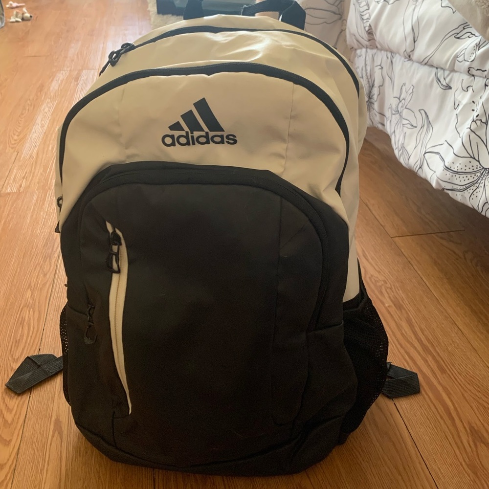 black and white Adidas backpack